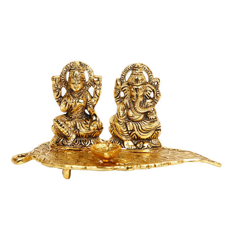 Metal Lakshmi Ganesh Idol Sitting on Leaf Platter With Diya Oil Lamp Statue