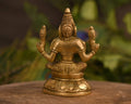 Brass Blessing Laxmi Idol Sitting On Round Base Statue