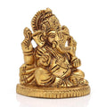 Brass Sitting Ganesh on Round Base Idol Statue