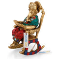 Ganesh Idol Sitting on Chair and Reading Ramayana Showpiece